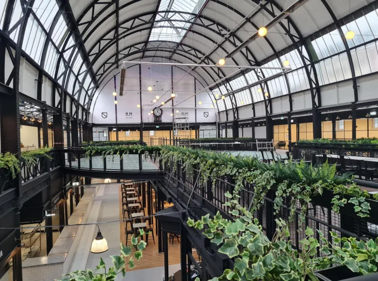 A refurbished Victorian indoor market taken from the first floor balcony.