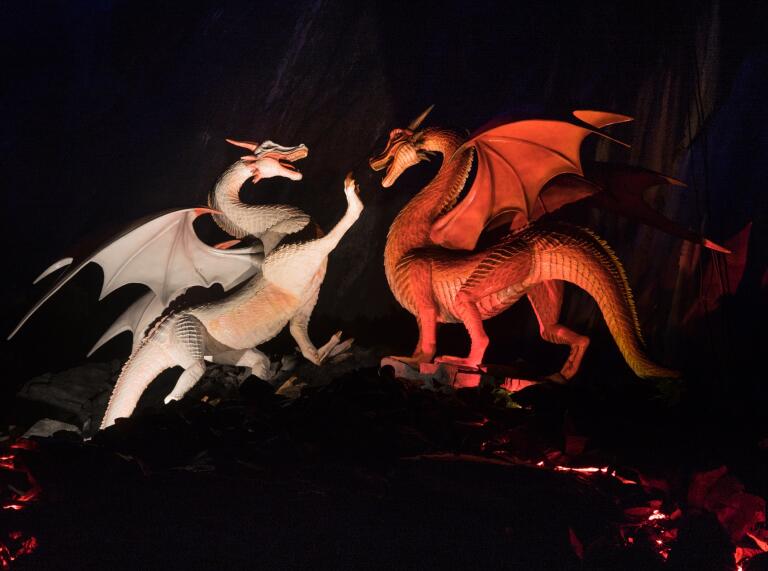 red and white dragons statues at King Arthur's Labyrinth attraction.