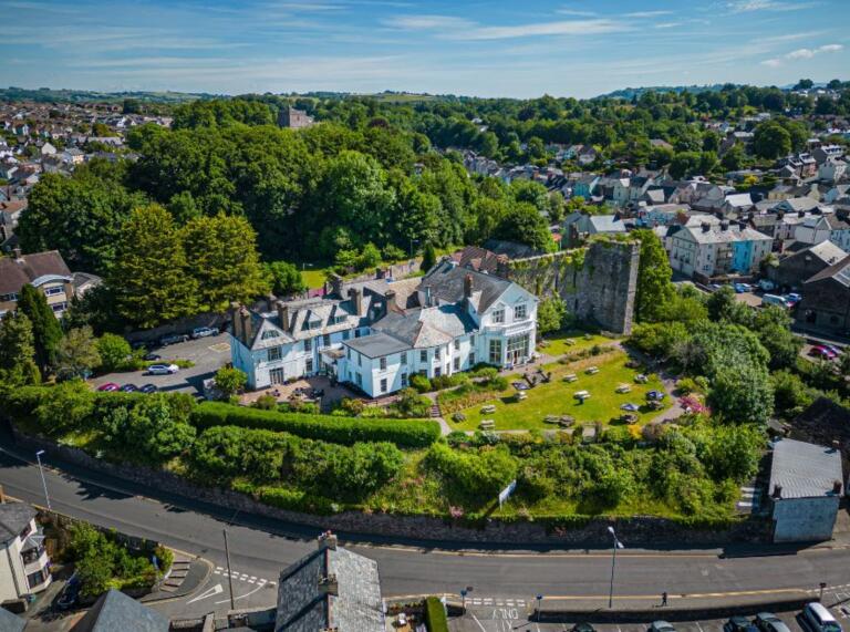 aerial view of Brecon Castle Hotel and surrounding area.