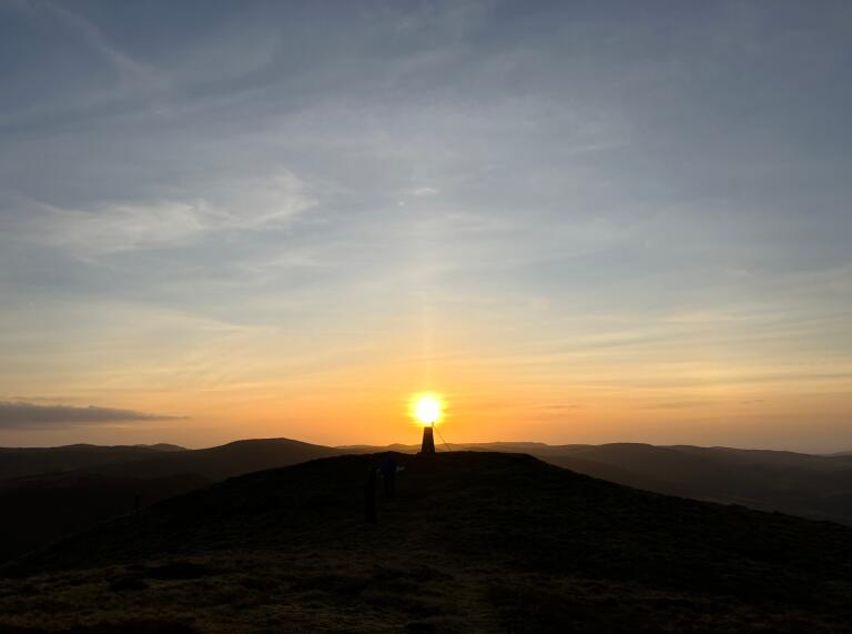 Sunset over a trig point. 