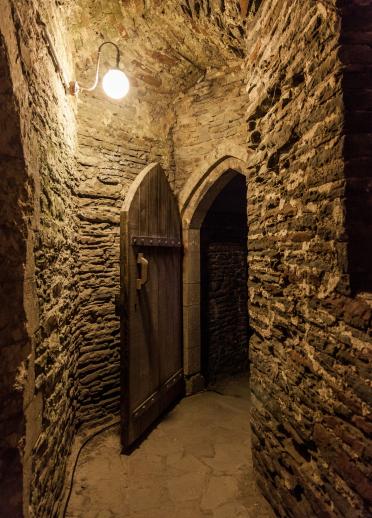 Inside Caerphilly Castle showing old brickwork and doorway.