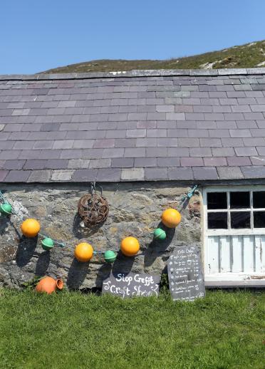 Outside of a craft shop on Bardsey Island