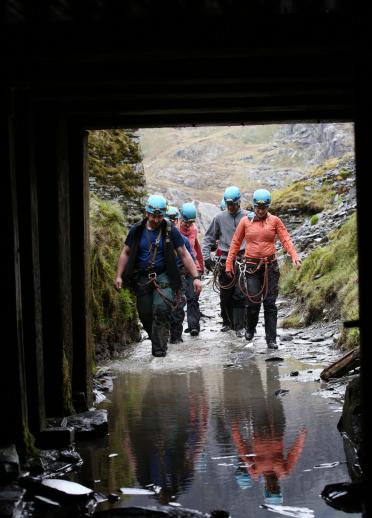 Adventure seekers at the entrance to the Go Below Xtreme experience at the Cwmorthin Mine, Tanygrisiau