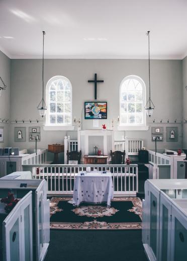 interior of church with white walls.