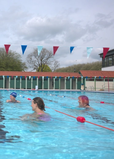 Women swimming in lido.