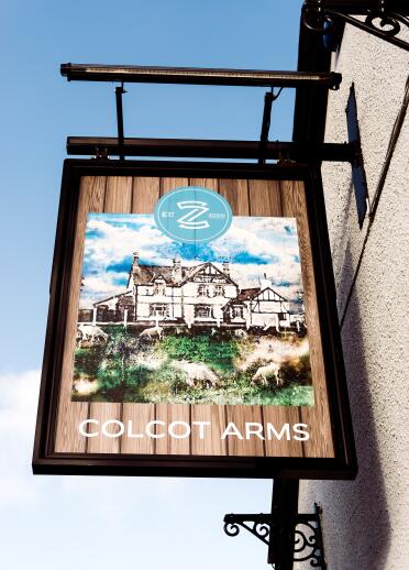 Sign and exterior of the Colcot Arms, Barry.