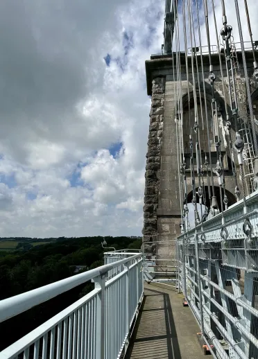 A walkway along a suspension bridge.
