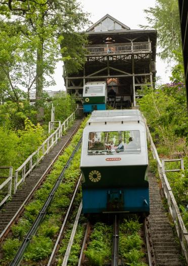 Two carriages moving on a cliff railway.