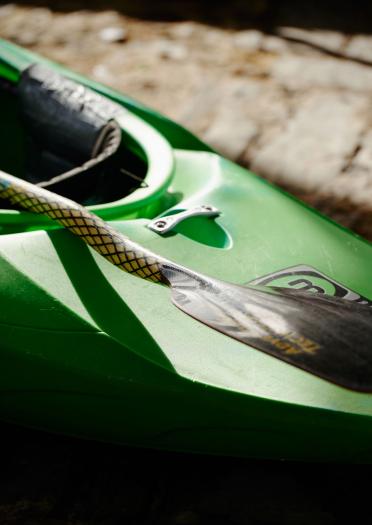 A green sea kayak.