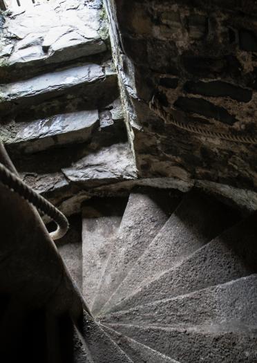 Stone spiral staircase inside Harlech Castle