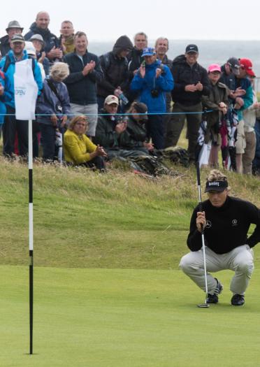 Bernhard Langher lining up a shot at the Senior Open Golf Championships, Royal Porthcawl Golf Club.