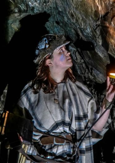 A woman looking at the mine workings at Silver Mountain Experience.