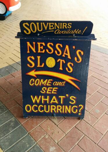 Nessa's Slots sandwich board.