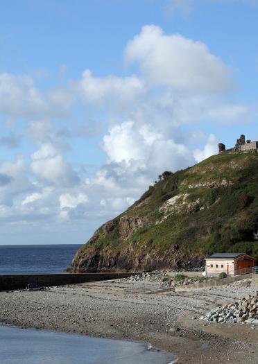 Criccieth Castle on a hill with beach below