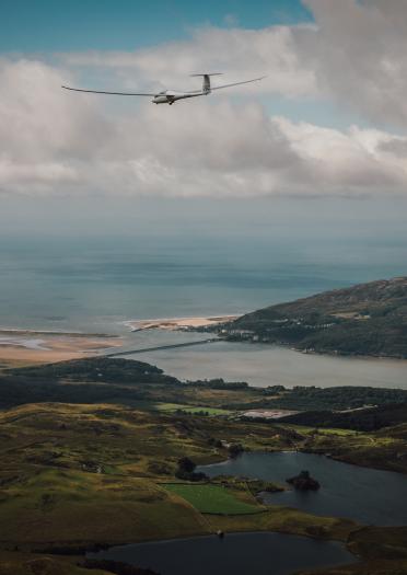 A glider over lakes and an estuary.