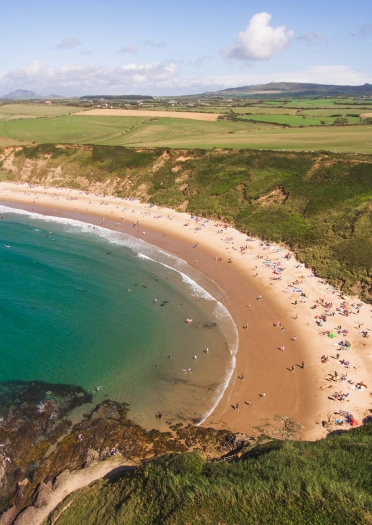 A wide, sandy beach from above.