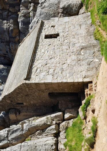 tiny chapel with cliff walls.