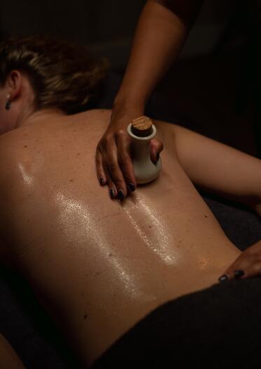 spa treatment on woman's back.