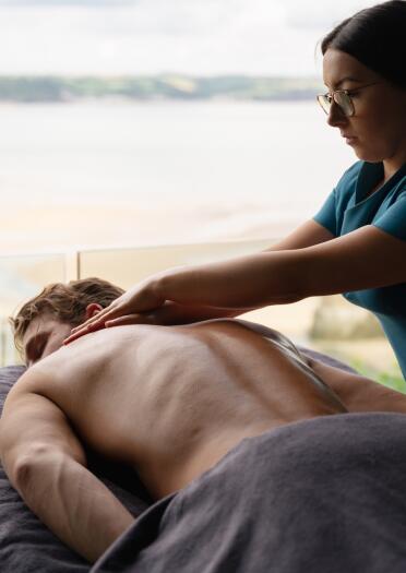 man receiving back massage.