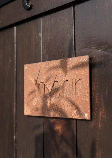 A sign on the door of Ynyshir near Machynlleth. 