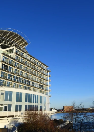 exterior of modern hotel on a sunny day.