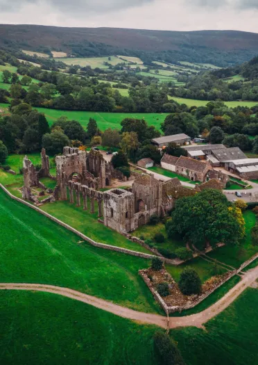 aerial view of priory ruins.