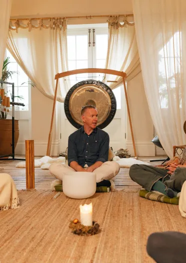 group meditation session in room.