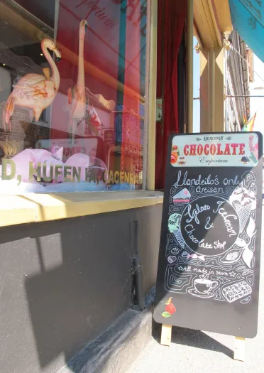 window display and sign outside chocolate shop.