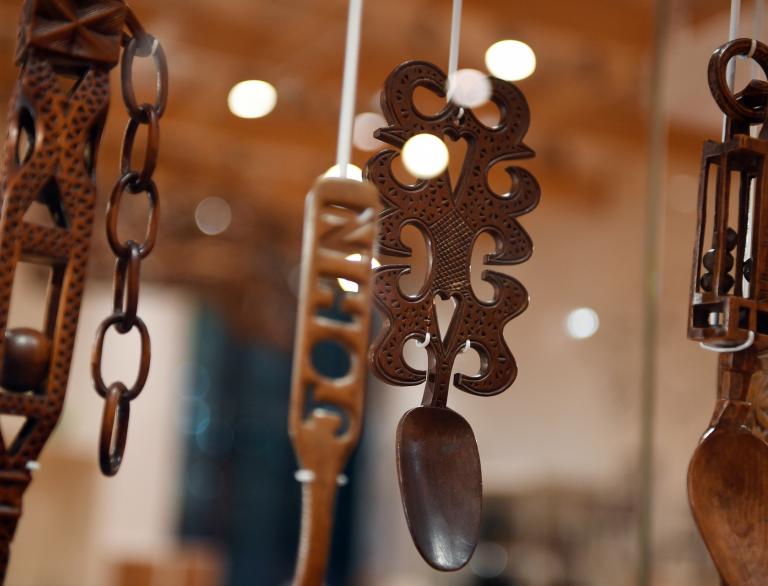 A display of hanging Welsh lovespoons at St Fagans National Museum of History, Cardiff. 