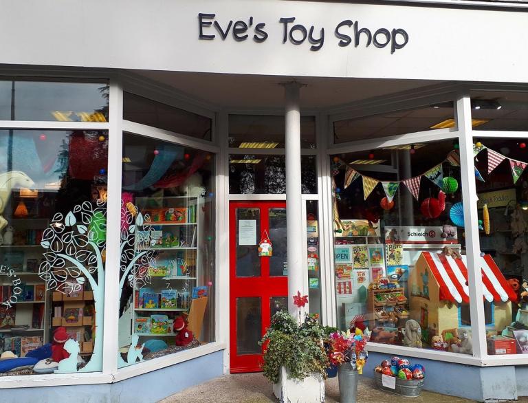 exterior of shop with sign Eve's Toy Shop.