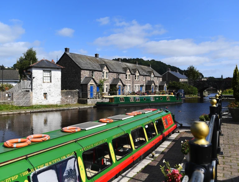 Canal boats on water at Monmouthshire &  Brecon Canal.