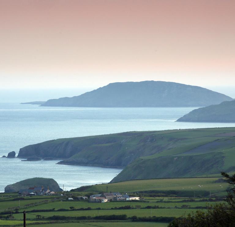 View of Bardsey Island from land.