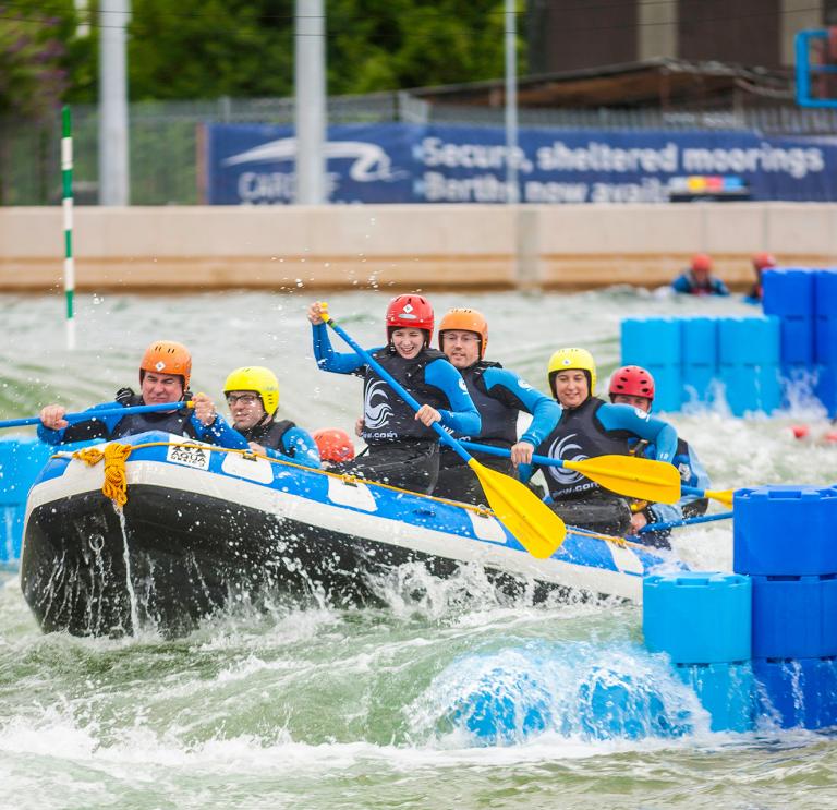 people whitewater rafting at Cardiff International White Water.