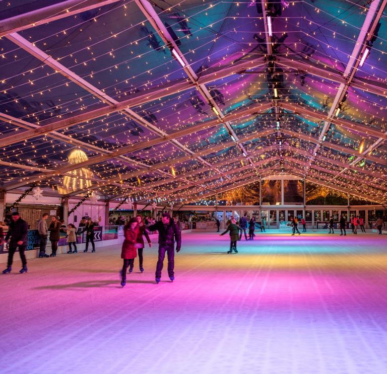 Indoor ice rink in Cardiff lit up for Christmas.