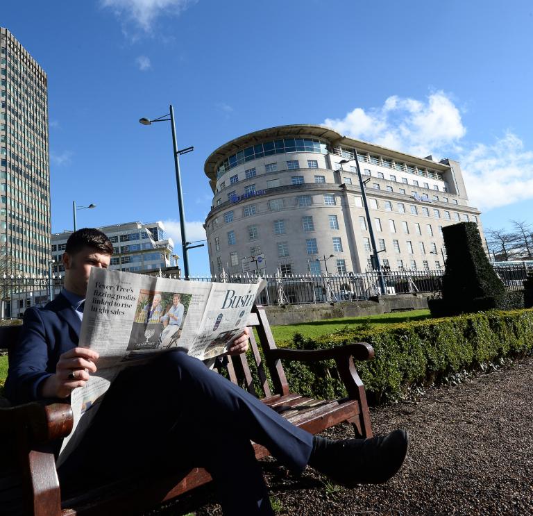 Reading the news in Cardiff
