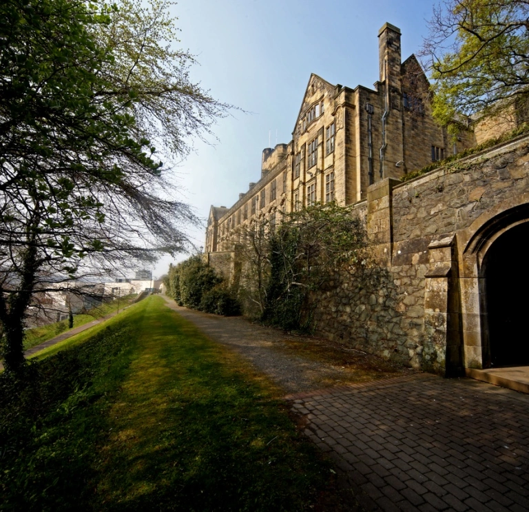 Outside a building at Bangor University.