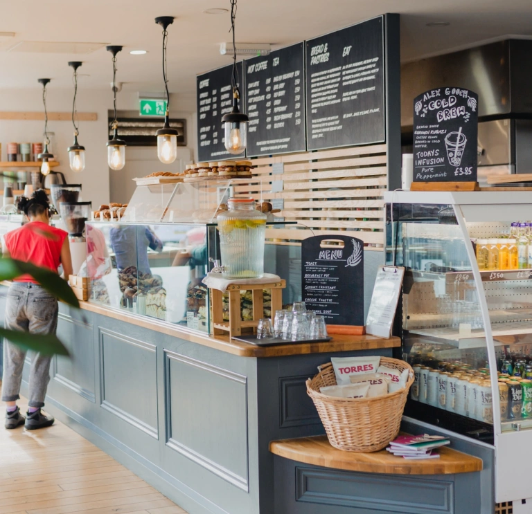 Counter in bakery with customer.