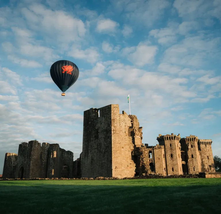 Hot air balloon over Raglan Castle