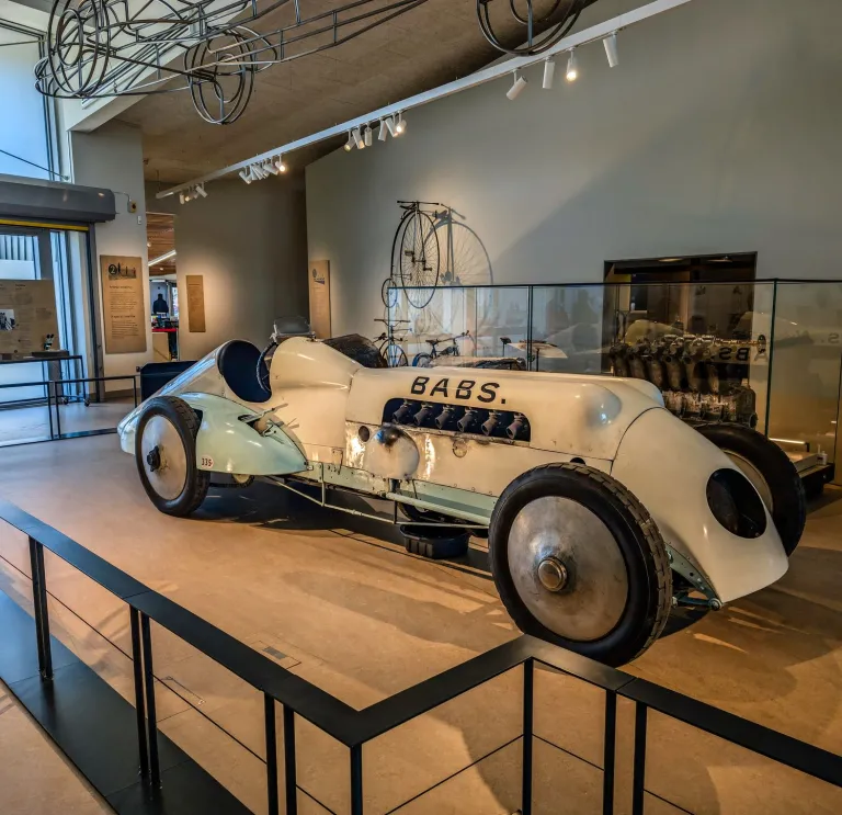 An old racing car in a museum.