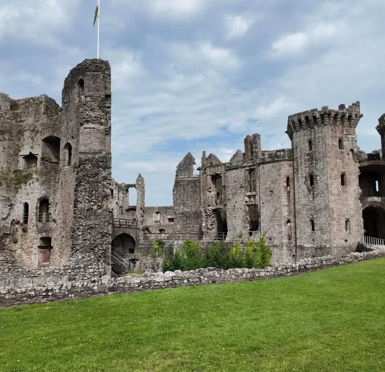castle ruins and lawn.