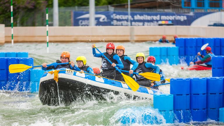 people whitewater rafting at Cardiff International White Water.