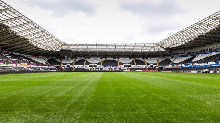 Wide angle shot Liberty Stadiums empty pitch in Swansea