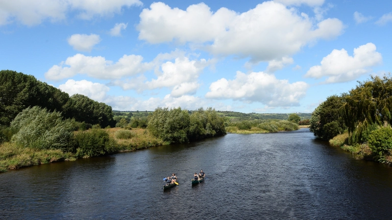 Two canoes on the River Wye.