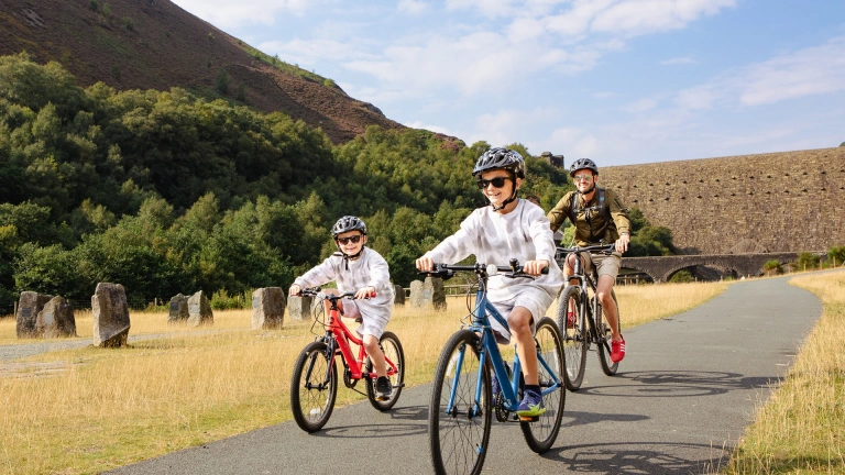 family on bikes in Elan Valley.