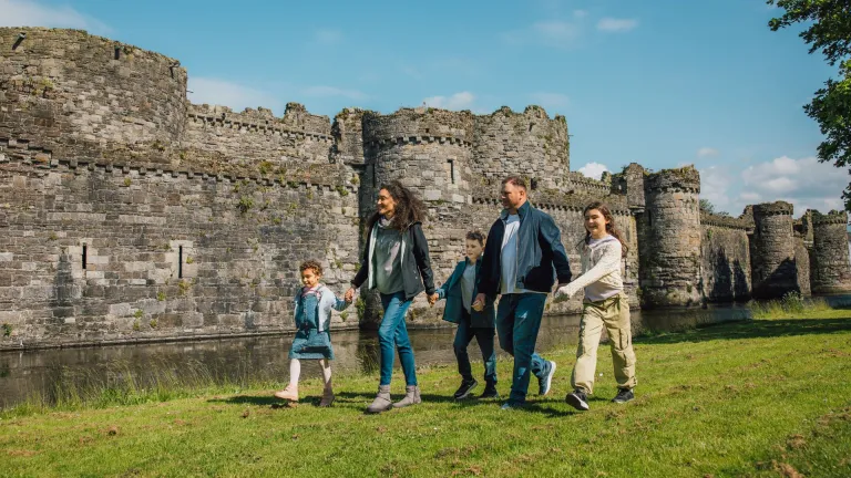 family walking near castle.
