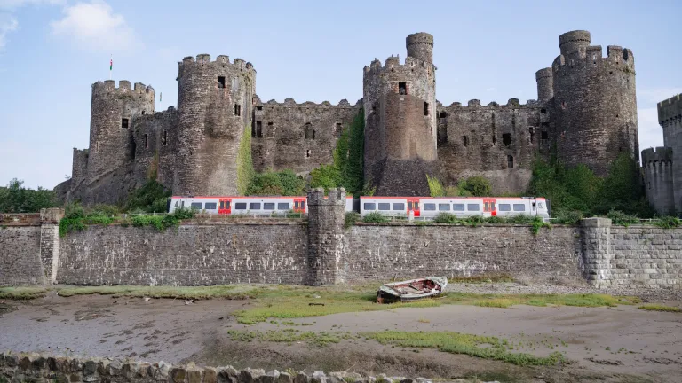 train passing castle.