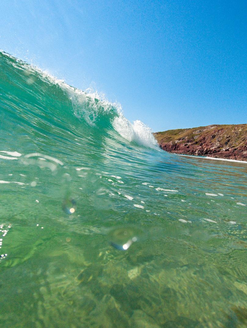 Wave crashing onto a Pembrokeshire beach.