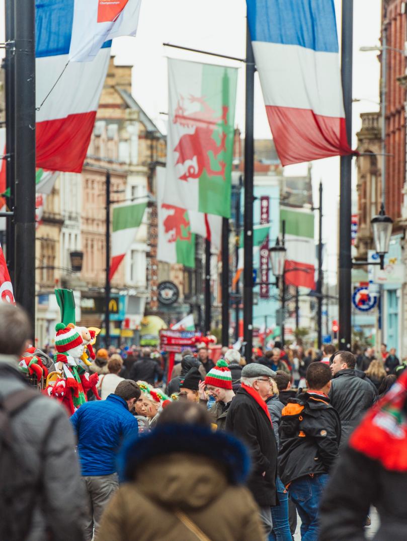 Rugby fans crowding the streets of Cardiff.