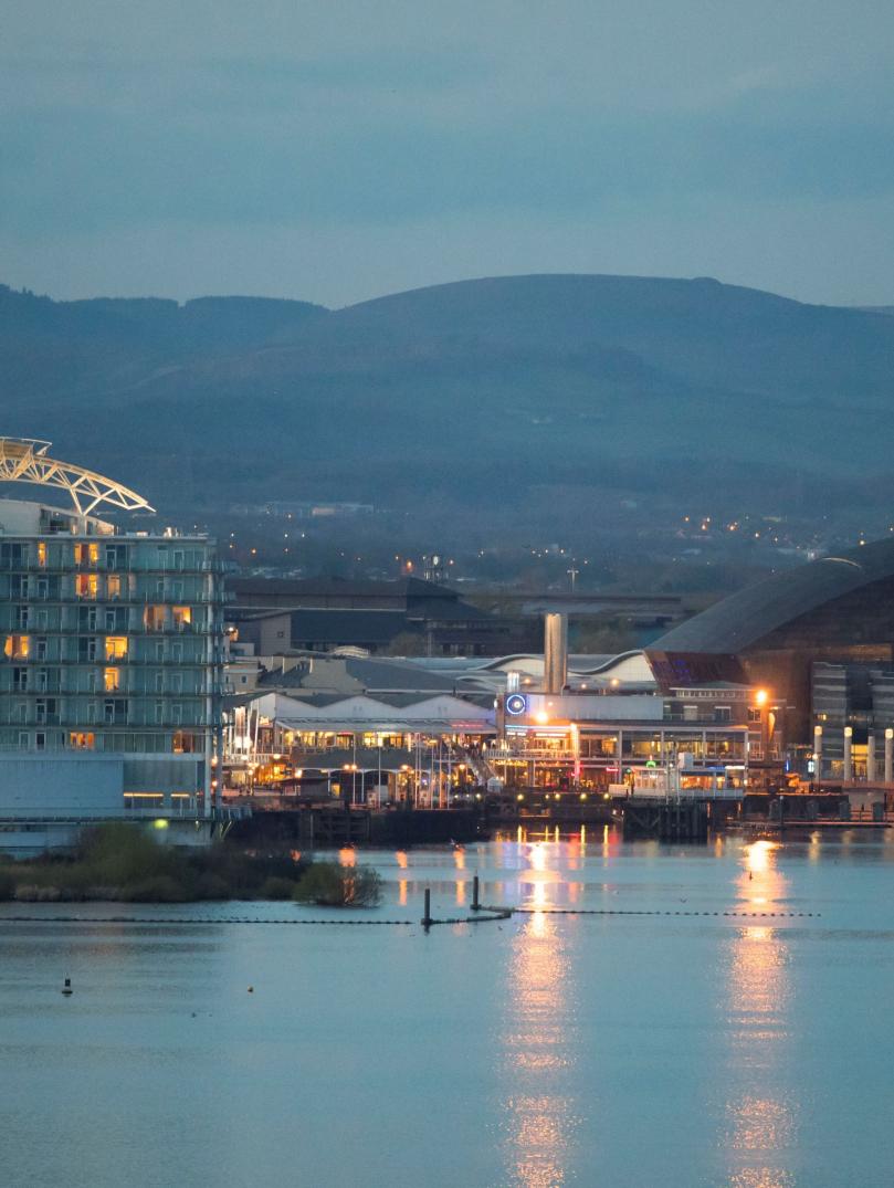 View of Cardiff Bay at dusk including the water