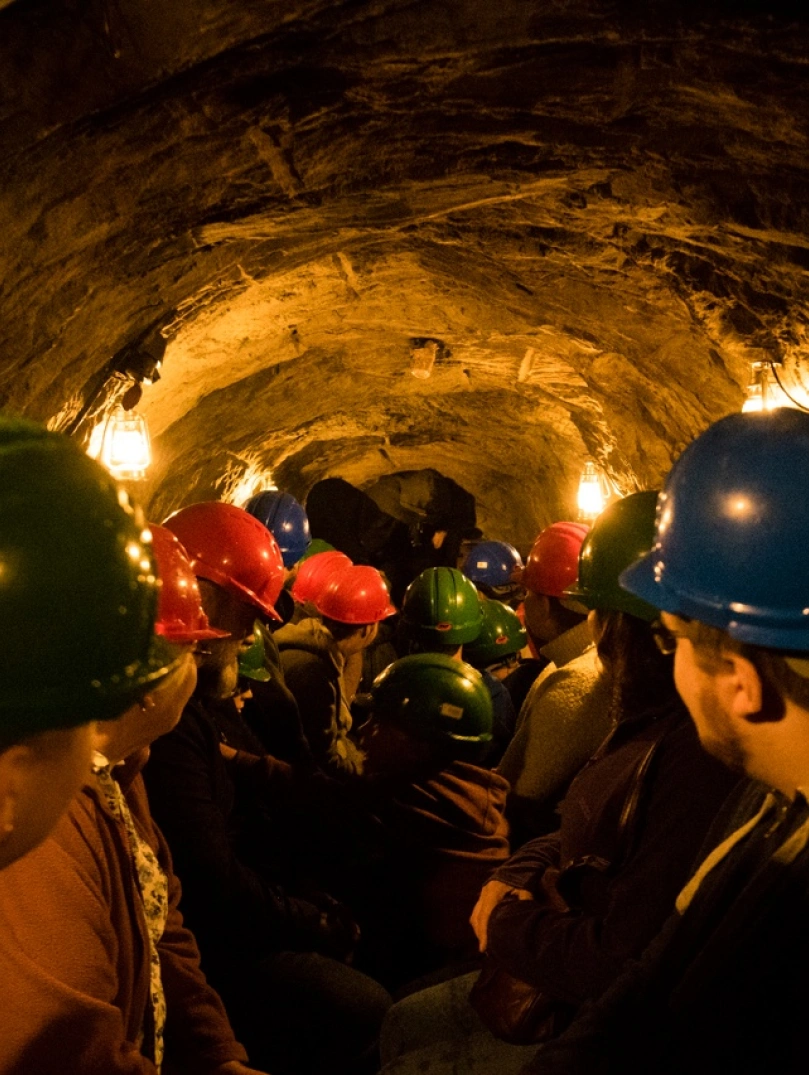 Tour group in the caves at King Arthur's Labyrinth